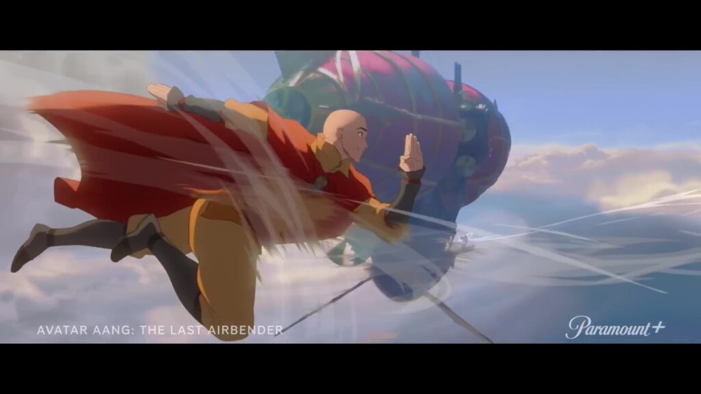 Aang vliegt met zijn staf langs een luchtschip in de film Avatar Aang: The Last Airbender